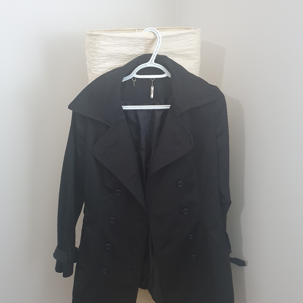 A black fashion jacket by XUSS in Colombia. Size P
